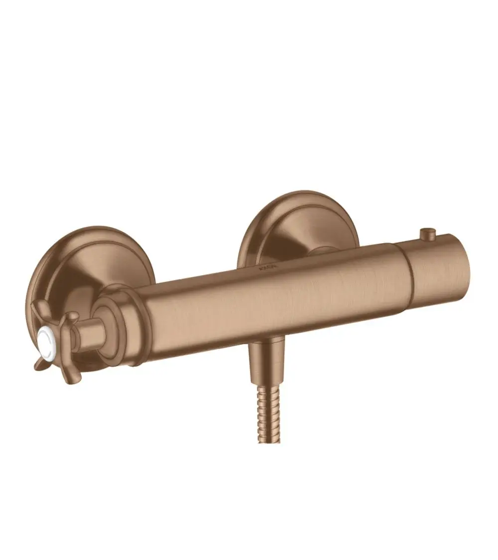 Brausethermostat mit Kreuzgriff in brushed red gold, montiert an der Wand. Hersteller ist AXOR. Mit flexibler Schlauchanschlussmöglichkeit.